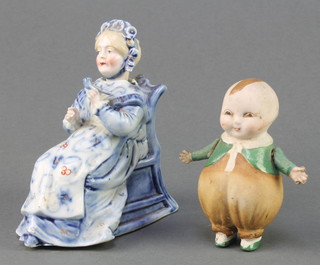 A 19th Century German porcelain figure of a lady sitting in a chair with nodding head 4", a ditto figure of a young boy with articulated arms 4"