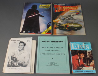 A 1967/68 handbook for the Elvis Presley International Appreciation Society, an Elvis pocket handbook, 4 editions of Elvis Monthly year 9 no.s 97, 98, 99 and 100, The Star Wars Story Book 1978 (pages loose), an Empire Strikes Back story book 1980 