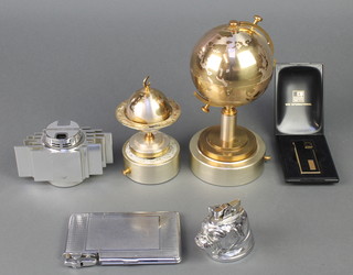 A 1950's/60's musical cigarette dispenser in the form of a Globe, ditto cigarette lighter, a King Craft cigarette case incorporating a lighter and 3 other lighters
