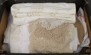 A linen table cloth and a quantity of various napiary