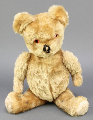A yellow teddybear with articulated limbs 17" 