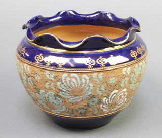 A Royal Doulton jardiniere, the blue ground with a band of stylised flowers 7 1/2" 