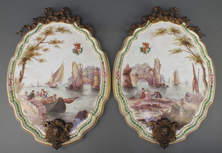 A pair of 19th century Continental painted porcelain plaques depicting figures in coastal towns, with later gilt metal mounts 17"