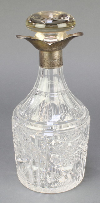 A cut glass decanter with silver collar Sheffield 1960 10" 