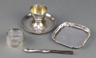 A silver egg cup Birmingham 1946, ditto napkin ring, dish and pair of tweezers, weighable silver 116 grams