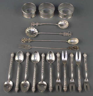 A pair of silver engine turned napkin rings Birmingham 1929, 1 other, minor cutlery, 198 grams