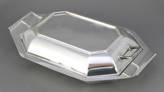 An Art Deco silver plated entree dish with swept handles 