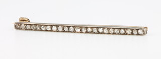 A diamond set bar brooch 