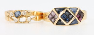 An 18ct gold sapphire and diamond ring, size Q 1/2 and a yellow gold gem set ring size T 