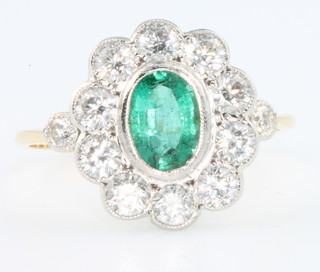 An 18ct yellow gold Edwardian style emerald and diamond ring, size O