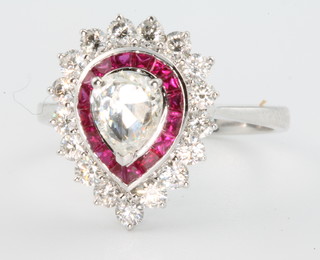 An 18ct white gold pear shaped ruby and diamond ring, size M 