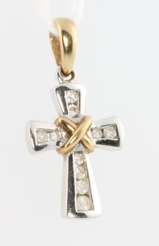 A 9ct 2 colour gold diamond set cross