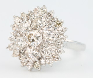 An 18ct white gold diamond cluster ring approx. 3ct, size N 1/2