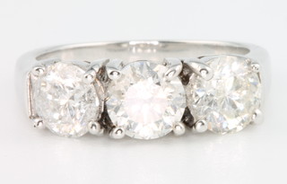 An 18ct white gold  3 stone diamond ring, approx 3ct, size M 1/2