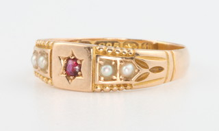 A Victorian 15ct yellow gold pearl and ruby ring, size K