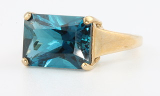 A 9ct yellow gold blue topaz  ring size N