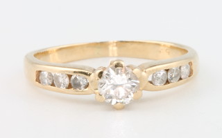 A 14ct yellow gold diamond ring size J 