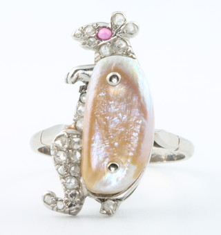 A white gold mother of pearl, diamond and ruby set ring in the form of a mouse, size O 1/2