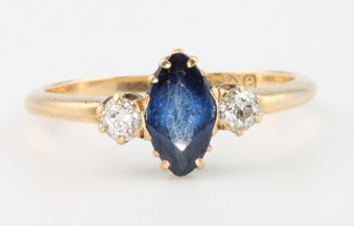 A 18ct yellow gold sapphire and diamond ring, size N