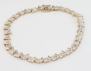 A 9ct diamond set bracelet