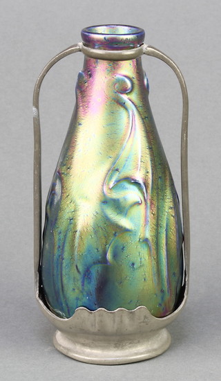 An Art Nouveau iridescent bottle vase contained within a pewter mount with twin handles 6" 
