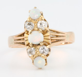 A Victorian yellow gold  opal 3 and  diamond 4 stone up finger ring, size R