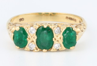 An 18ct yellow gold Victorian emerald and diamond ring size Q 1/2