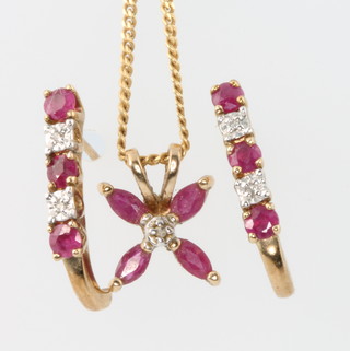 A 9ct yellow gold ruby and diamond set necklace and earrings 