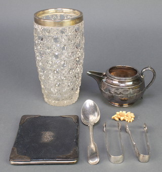 An Edwardian silver mounted leather wallet London 1901, a silver collared cut glass vase, a William IV silver dessert spoon London 1837, 2 pairs of plated sugar nips, a plated jug and a carved brooch 