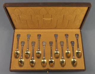 A set of 12 Tiffany & Co Sterling silver tea spoons with Zodiac handles with fitted case, 160 grams