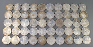 A set of 50 John Pinches silver medallions "The Genius of Rembrandt" 105 ozs contained in a mahogany finished cabinet
