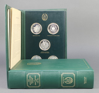 A John Pinches 4 volume set of Mountbatten Medallic History of Great Britain and The Sea comprising 100 hallmarked Sterling silver medallions, 109 ozs 