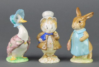 3 Beswick Beatrix Potter figures - Mrs Flopsy Bunny 1942 4", Jemima Puddle Duck 1092 4 3/4" and Amiable Guineapig style 2 2061 3 1/2" 