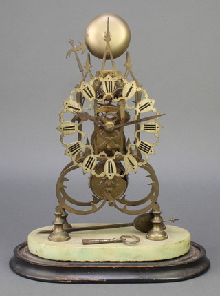 A Victorian brass skeleton clock with pierced silvered chapter ring, striking on a bell, with onyx base and wood stand 16" 