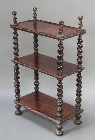 A William IV rectangular rosewood 3 tier what-not, raised on spiral turned supports with bun feet, 40"h x 24 1/2"w x 12 1/2"d 