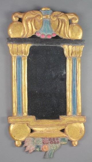 A rectangular plate wall mirror contained in a carved gilt wood frame supports by 2 columns 26"h x 13 1/2"w 