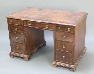 A 19th Century mahogany desk with brown leather inset writing surface above 1 long and 8 short drawers, raised on bracket feet 30 1/2"h x 48"w x 28"d 
