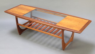 A G-Plan Astro rectangular teak coffee table, the centre section inset a plate glass panel above a slatted base, raised on shaped supports 17 1/2"h x 60"l x 21 1/2"w 