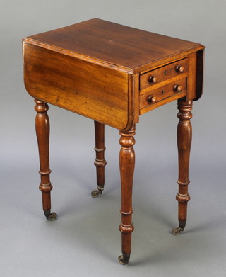 A Victorian mahogany Pembroke work table fitted 2 short drawers, raised on turned supports ending in brass caps and casters 27 1/2"h x 20"w x 13 1/2" when closed x 28" when opened 