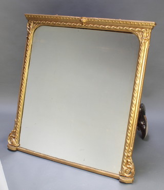 A Victorian arched plate over mantel mirror contained in a plaster and gilt painted frame 43"h x 41"w 
