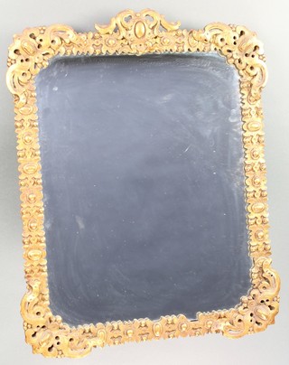 A Victorian rectangular plate mirror contained in a decorative gilt plaster frame 24" x 19" 