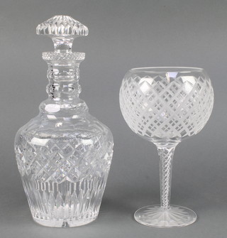 A cut glass goblet with air twist stem and a mallet shaped decanter and stopper 11"