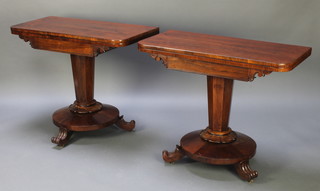 A pair of William IV D shaped rosewood card tables, raised on a chamfered column with circular base and scroll feet 29 1/2"h x 36"w x 17 1/2"d  