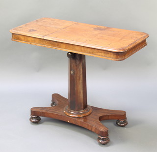 A 19th Century rectangular mahogany adjustable reading table raised on chamfered column and triform base with bun feet 28"h x 25"w x 17 1/2"d 