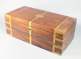 A 19th Century mahogany and brass banded travelling writing slope with well fitted interior and retaining bolts to the side,  fitted numerous compartments 9"h x 24"w x 12"d  
