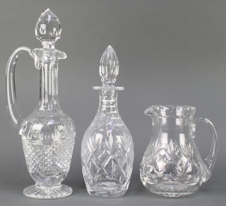 A cut glass baluster water jug 7", a mallet shaped decanter 12" and a ditto ewer 15" 