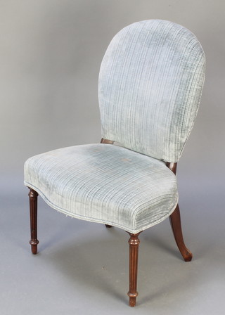 A 19th Century French chair, the seat of serpentine outline, raised on turned and reeded supports 