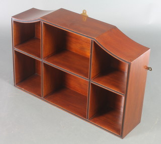 An Edwardian mahogany hanging wall shelf of arched shaped divided into 6 sections 20"h x 30"w x 7"d  