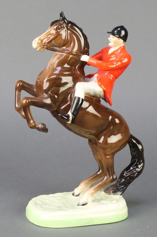 A Beswick figure Huntsman on rearing horse 868, style 2, 10" 