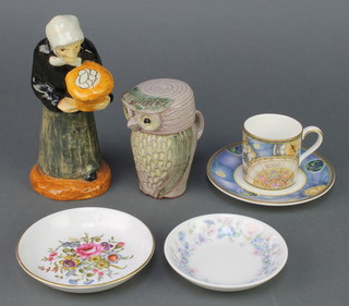 A Dutch figure of an elderly lady 7", a teacup and saucer, 2 dishes and a Studio jug 